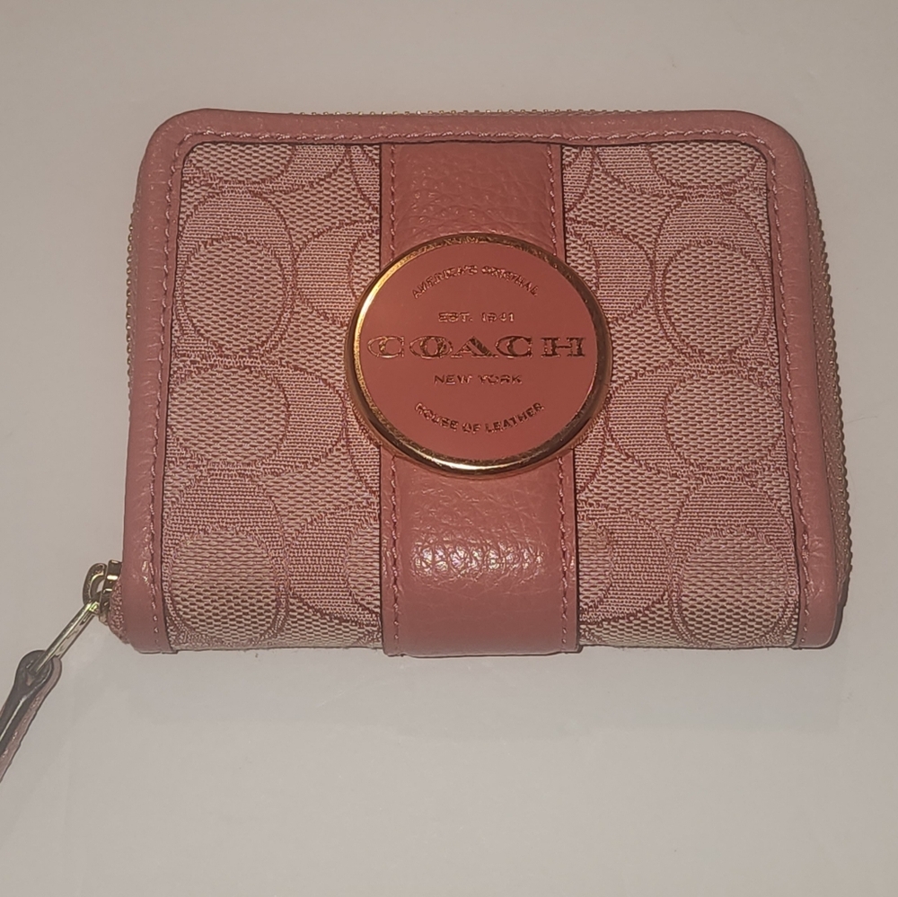 Coach Lonnie Small Zip Around Wallet in the color Taffy.